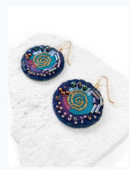 Om handmade earrings